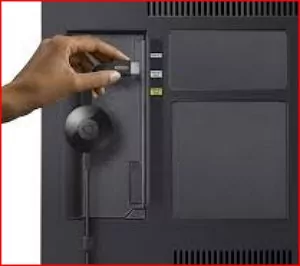 plug the Google Chromecast stick into the USB por